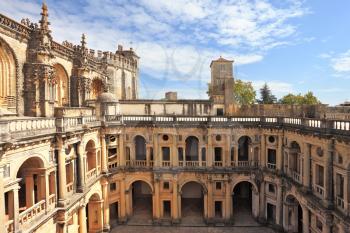  Courtyard, patio, surrounded by a gallery. The imposing medieval castle of the Knights Templar and the bell tower