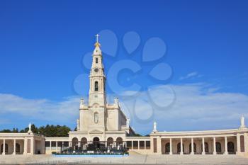 The grand memorial and religious complex in the small Portuguese town of Fatima. A huge tower and a marble colonnade around the square