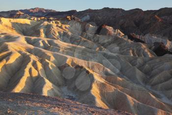The famous part of Death Valley in California - Zabriskie Point. Sunset