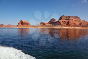  Magnificent Lake Powell. Picturesque red cliffs reflected in the smooth water of the lake