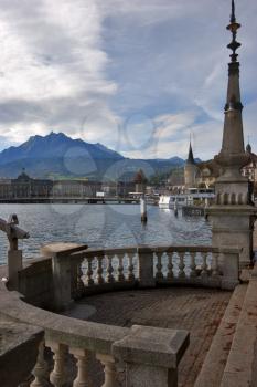  Quay of lake in Lucerne, the walking steam-ship and a telescope