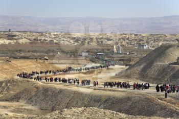  Road to the river Jordan in day of sacred Christening with going pilgrims