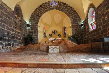 One of the most ancient churches on Sea of Galilee. A stone laying from black stones and an altar