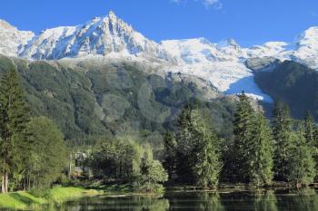 Beautiful park and lake at the bottom of Mont Blanc. The capital of ski tourism - Chamonix.