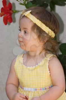 Little girl looking reflectively

