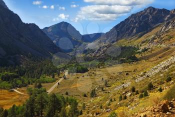 Huge picturesque valley in mountains of national park Yosemite. Clear solar autumn day
