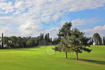 The most romantic landscape park a garden in Italy. Charming green grassy lawns are surrounded with groves