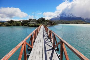 National Park Chile - Torres del Paine. Easy Bridge at Lake Pehoe connects the island and the shore of Lake