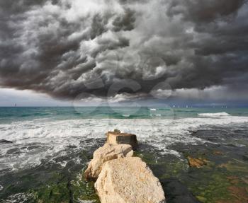 Severe storm cloud over the surf