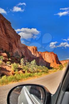  The car on road to canyon Burr in state of Utah 