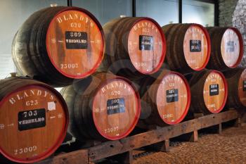 MADEIRA  ISLAND, PORTUGAL - OCTOBER 8: Classic huge oak barrels of wine  Madera. Storage of wine well-known firm BLANDY'S