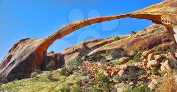  A unique arch in the form of a long thin tape from sandstone in park  Arches  in the USA