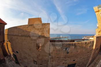 The ancient small city Jaffo on the bank of Mediterranean sea, in  lens Fish eye