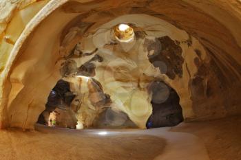 The Belfry Beit Guvrin caves in Israel. Giant halls regular shape with a hole in the roof