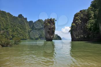 Fantastically beautiful landscape. The closed lagoon at ocean. Charming island - a rock in the form of a vaseJames Bond
 
