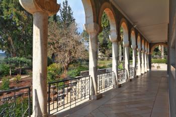 The marble gallery with columns surrounds the Basilica. Church on Mount of Beatitudes. Israel, lake Tiberias. 