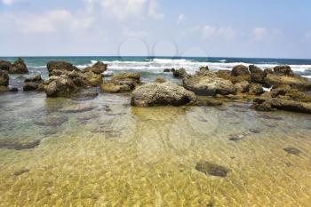 Stony coast of Mediterranean sea in hot summer day