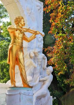 Waltz King. Gorgeous gilded statue of Johann Strauss with violin