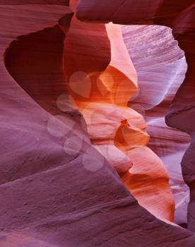 The play of light, colors and shades gives rise to freakish associations. Midday in a red-orange  Antelope Canyon. 
