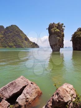 The magnificent island of James Bond. Island-vase in the greenish water of the southern sea
