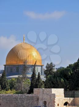 The golden dome of the mosque of Omar shines in the morning sun. Jerusalem, Israel