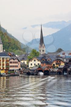 Hallstatt - the most beautiful small town in Austria at sunset. The picture was taken on board a pleasure boat