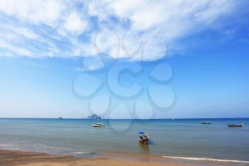 The boats in Thailand, April. The wonderful beach and spectacular islands. Azure warm water and white sand