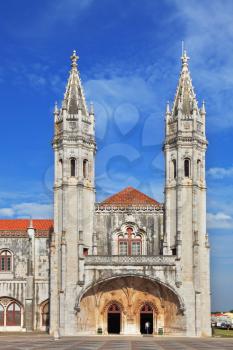 The main attraction of Lisbon - Jeronimos monastery on the bank of the River Tagus. Two slender towers topped by crosses