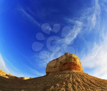 Ancient mountains in desert of Israel on a sunset, photographed by an objective  the Fish eye 