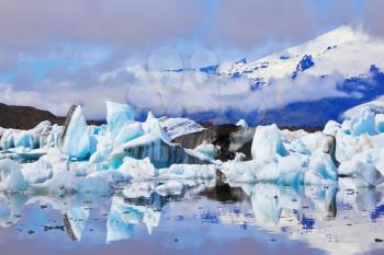 The Arctic Ocean. Iceland. Floating ices reflected in the lagoon  Yokulsarlon 