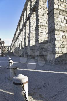 Aqueduct in the Spanish Segovia, shined by the spring sun