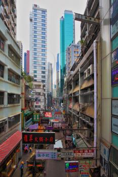 HONG KONG - DECEMBER 11, 2014: Hong Kong Special Administrative Region. On a narrow street of the old Hong Kong is the daily life