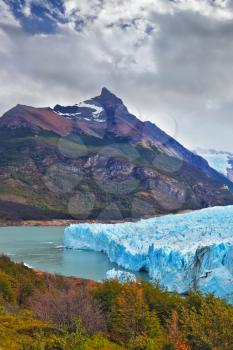  Los Glaciares National Park in Patagonia. Colossal Perito Moreno glacier in Lake Argentino. Wintry summer day