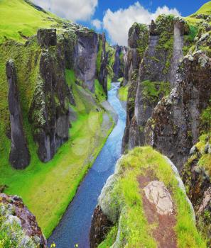 The most picturesque canyon Fjadrargljufur  and the shallow creek, which flows along the bottom of the canyon. Fantastic country Iceland