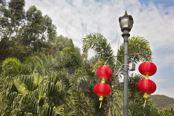 The usual lamppost decorated by beautiful red lanterns in the Chinese style