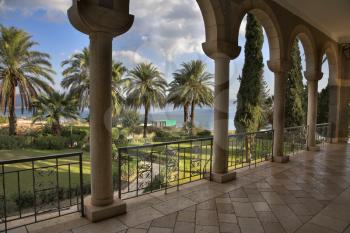 The fine park shined by the sun at a monastery at lake Kinneret