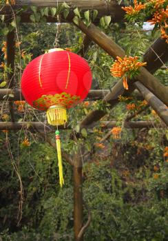 Traditional red New Year's spheres in the Chinese park of entertainments