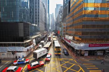HONG KONG - DECEMBER 11, 2014: Hong Kong Special Administrative Region. Modern skyscrapers and narrow streets between them