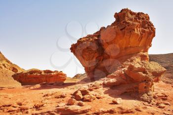 Freakish figures from red sandstone in desert Arava in Israel
