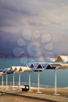 Magnificent rainbow during a spring thunder-storm on the Dead Sea