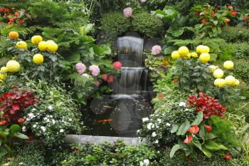 Magnificent cascade fountain in well-known Butchard - garden on island Vancouver