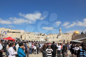 Jerusalem - October 16: The Holy Western Wall of the Temple. Thousands of Jews had gathered for morning prayers at Sukkot October 16, 2011 in Jerusalem, Israel
