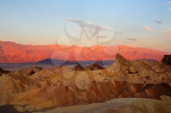 Precise mountain folds well-known a Zabrisky-point in Death valley in the USA. A sunset