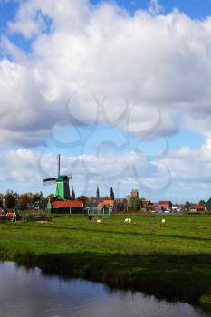 Windmills in museum village in Holland. Good autumn day