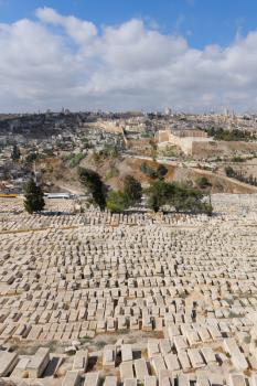 An ancient cemetery in Jerusalem on the Mount of Olives. View on Jerusalem 
