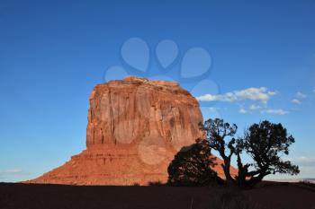 Dusk in Monument Valley. Famous red sandstone monoliths 