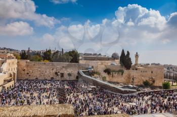 The area in front of Western Wall of Temple filled with people. Jerusalem, the Jewish holiday of Sukkot