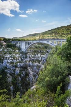 The largest alpine canyon Verdon. The white bridge over tributary of the river Verdon Artuby. Verdon, Provence, France