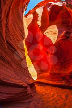 Fantastic play of light and color in red tunnel. Arizona, USA. Fantastic slot canyon Antelope in the Navajo reservation