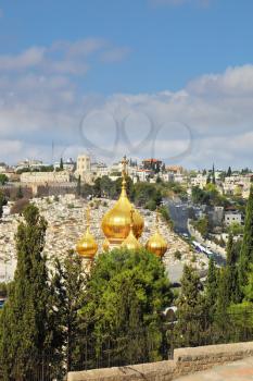 Golden domes of the Church of St. Mary Magdalene. Mount of Olives in Jerusalem